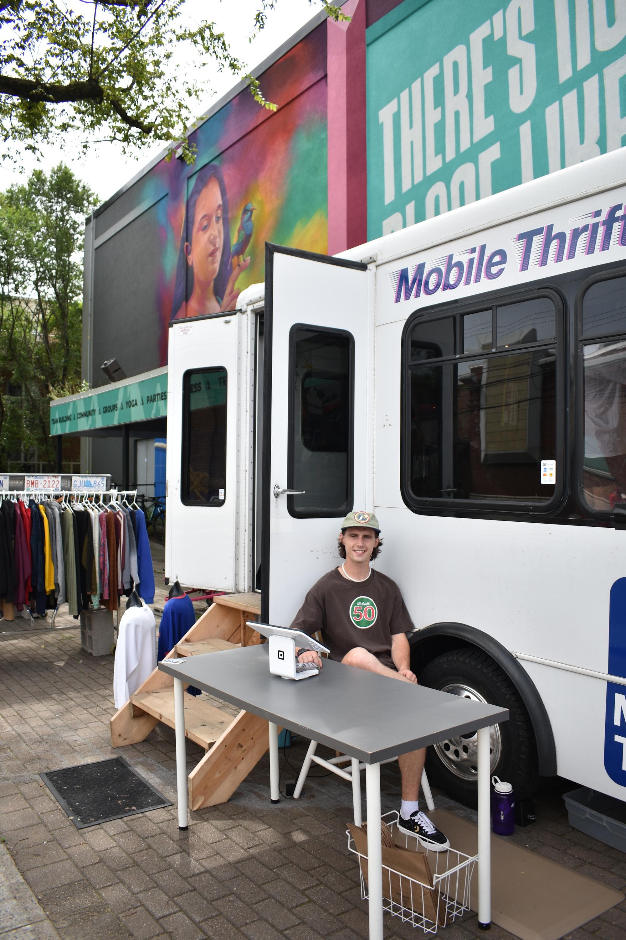 Daniel in front of the Thrift Bus